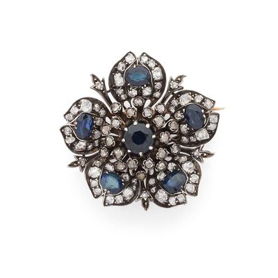 une broche en forme de fleur, sertie de saphirs et de diamants