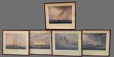 three framed pictures of sailboats in a row on a wall