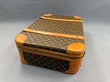 louis vuitton monograme suitcase with leather trims