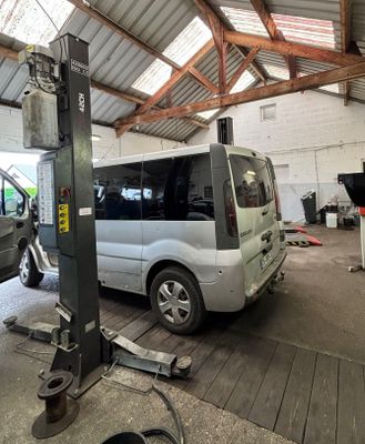 a white van that is parked in a garage