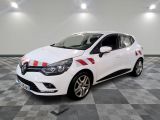une voiture blanche avec une bande rouge sur le côté
