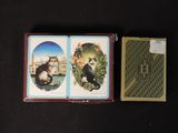 two cards that are sitting next to each other on a table
