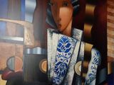 un tableau représentant une femme vêtue d'une robe bleue et blanche