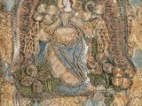an image of a tapestry with a picture of a woman holding a child