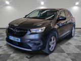 the new opel suv is parked in the showroom