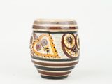 a close up of a vase with a design on it