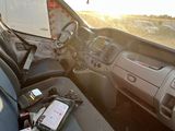 a view of a truck from the driver ' s seat of the truck