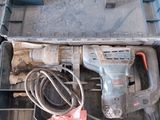 a tool box with a hammer and other tools in it