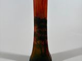 an image of a vase with a tree on it