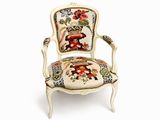 une image d'une chaise dont l'assise est recouverte d'un rembourrage floral
