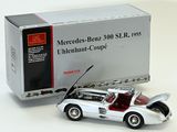 a model of a car with a box in the background