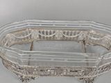 an image of a glass tray with a handle on it