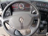 dashboard of a car with a steering wheel and dashboard gauges