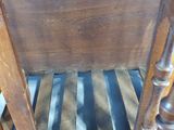 a wooden table with a shelf on top of it