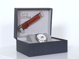 a watch and a watch band in a box on a table