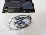 a picture of a motherboard and cables on a table