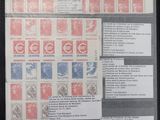 an open book with a bunch of different stamps on it