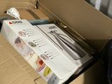 a cardboard box with a bunch of items inside of it