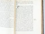 an open book that has a picture of a cat on it