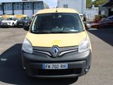 une camionnette jaune et noire garée sur un parking