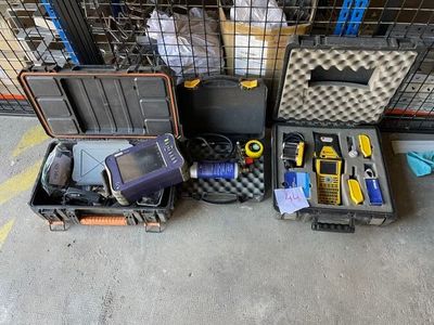 many different tools in the case on the floor