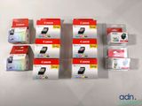 several canon ink cartridges are stacked on top of each other on a white surface