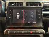 a picture of a car dashboard with a display on it