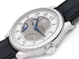an image of a close up of a wrist watch on a white surface