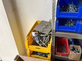 a box full of assorted tools in a room