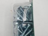 a box of screws that are on the wall