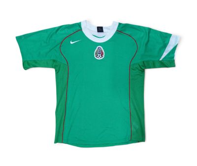 a green soccer jersey with a white collar and a black and white logo