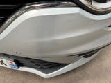 a close up of the front bumper of a car