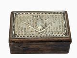 decorative wooden box with metal decoration on top of white background