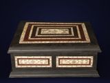a black and white box with a design on it
