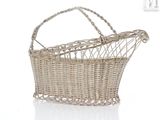an image of a wicker basket with a handle on a white background