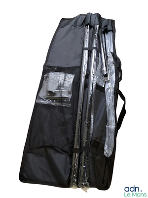 une image représentant un grand sac noir muni d'une poignée