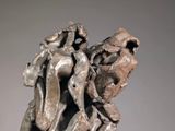 a sculpture of a man and a woman holding each other