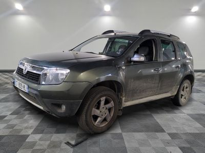 a picture of a grey dacia parked in a garage