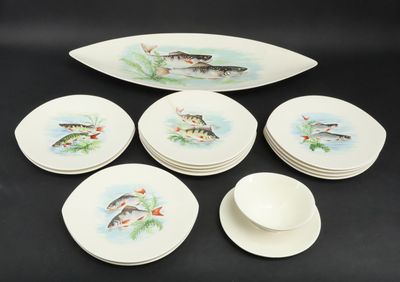 six plates and a bowl with fish on them