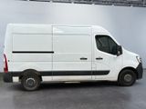 a white van that is parked in a room