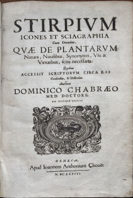 a close up of an old book with writing on it
