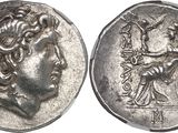 a silver coin with an image of a woman on it
