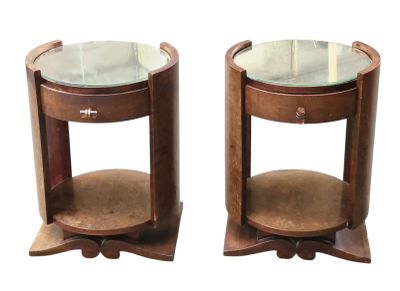 pair of round end tables with glass top and wooden base