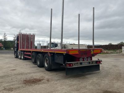 a semi truck that is parked in a lot