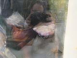 une femme se prenant en photo dans un miroir