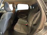 the back seats of a car are empty and the passenger seat is empty
