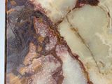 a close up of a marble slab on a table