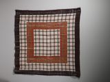 an image of a piece of cloth hanging on a wall