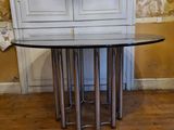 a table with a glass top in a room