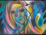 painting of a woman ' s face in a colorful abstract style